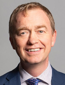 Richard Townshend, CC BY 3.0 <https://creativecommons.org/licenses/by/3.0>, via Wikimedia Commons - https://commons.wikimedia.org/wiki/File:Official_portrait_of_Tim_Farron_MP_crop_2.jpg